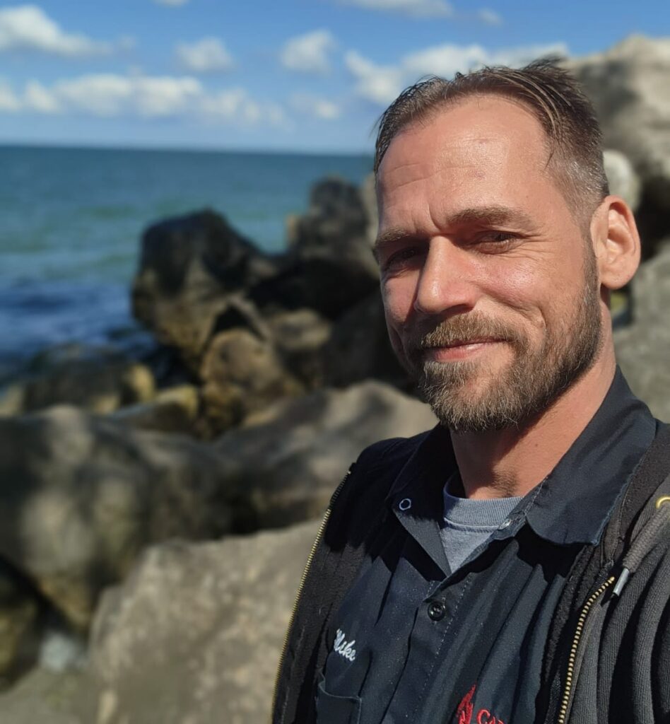 Mike Bowles, Owner and Lead Technician at Cardinal Fire & Safety, Northeast Ohio local fire protection expert, wearing company polo shirt